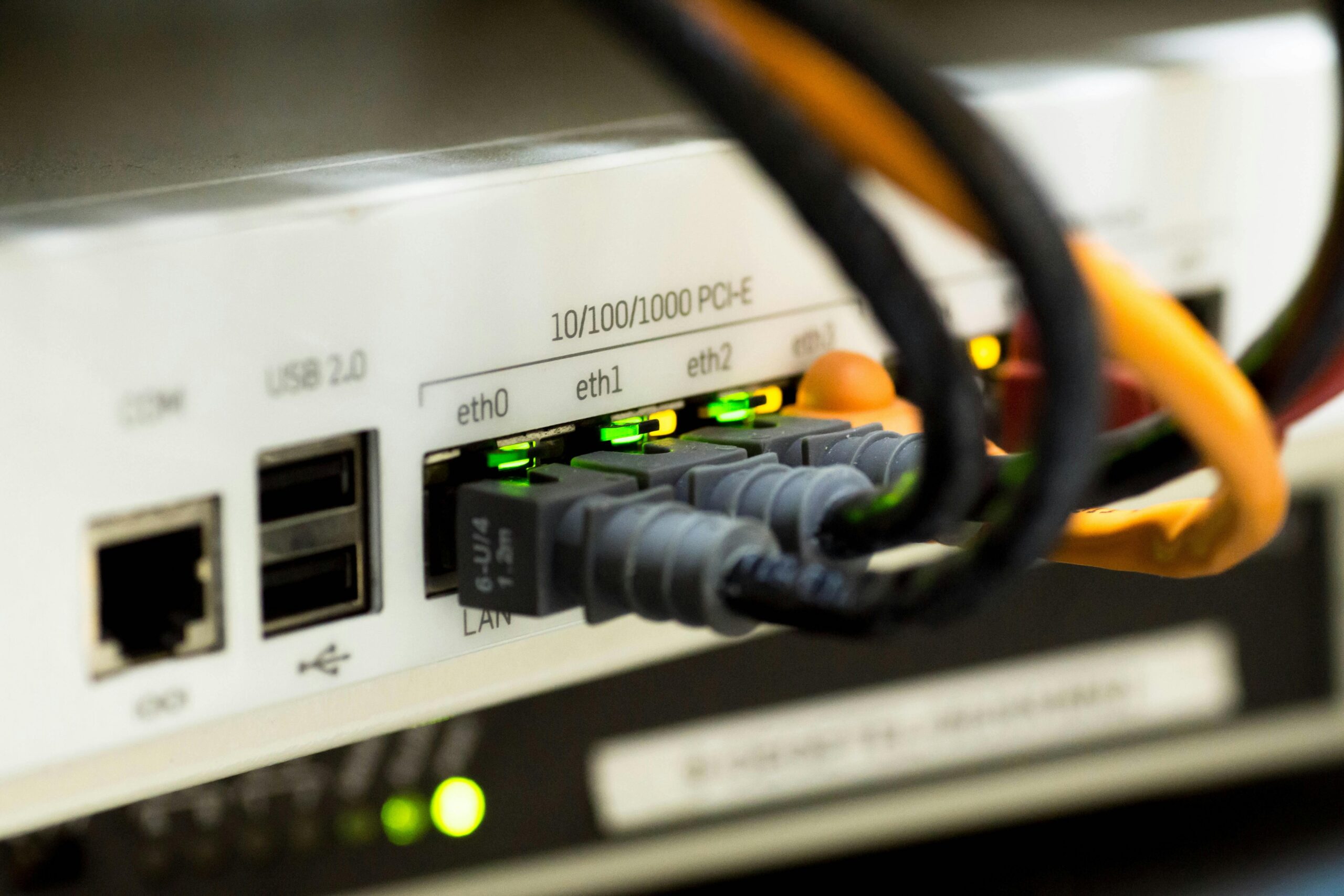 Rear view of router with ethernet cables plugged in